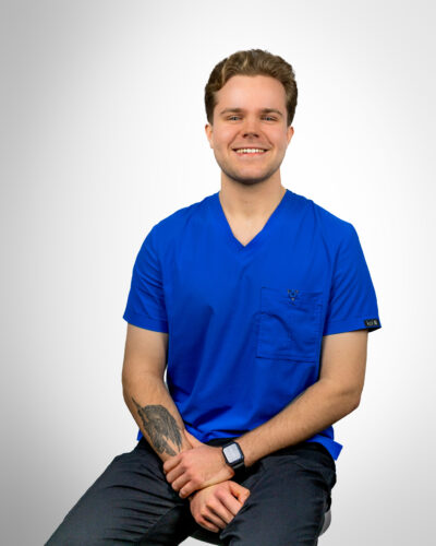 Uśmiechnięty fizjoterapeuta CFF